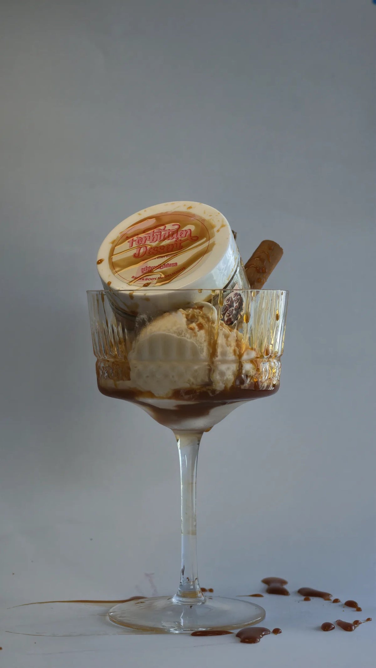 Forbidden Dessert whipped body butter styled in a dessert glass